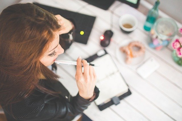 woman thinking about how to plan a room remodel